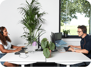 Two colleagues working at the office