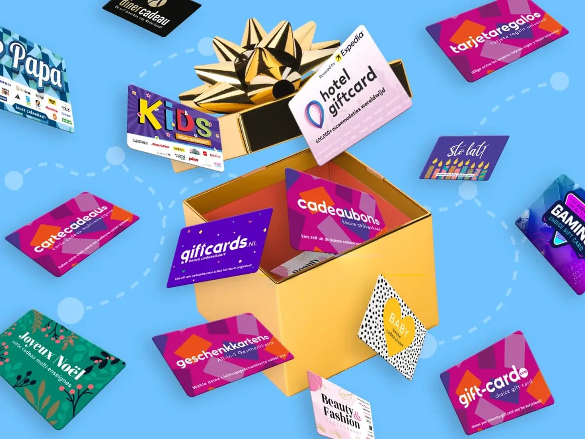 Gift cards from our platforms around an open gift box